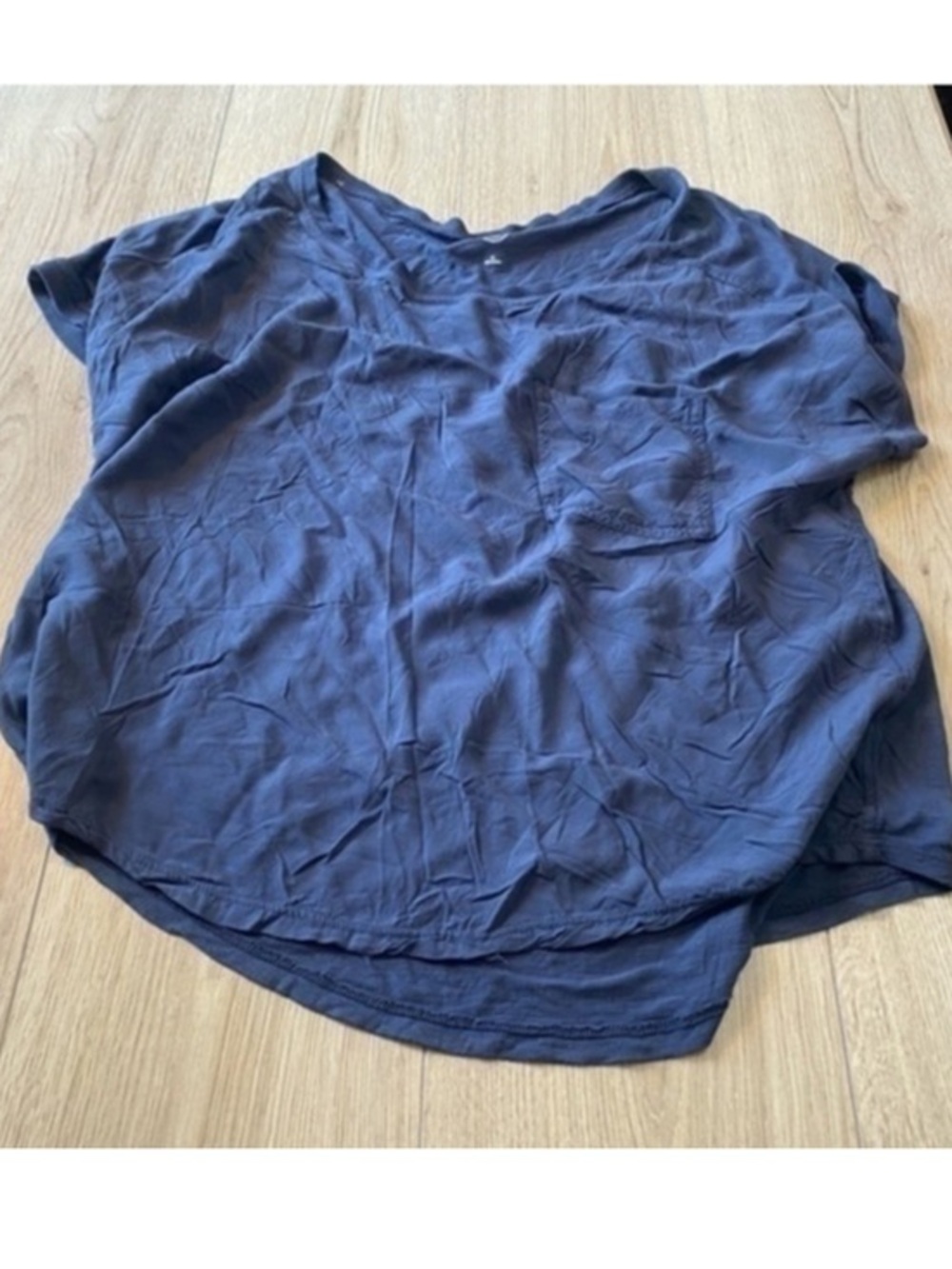 So blue short sleeve shirt top